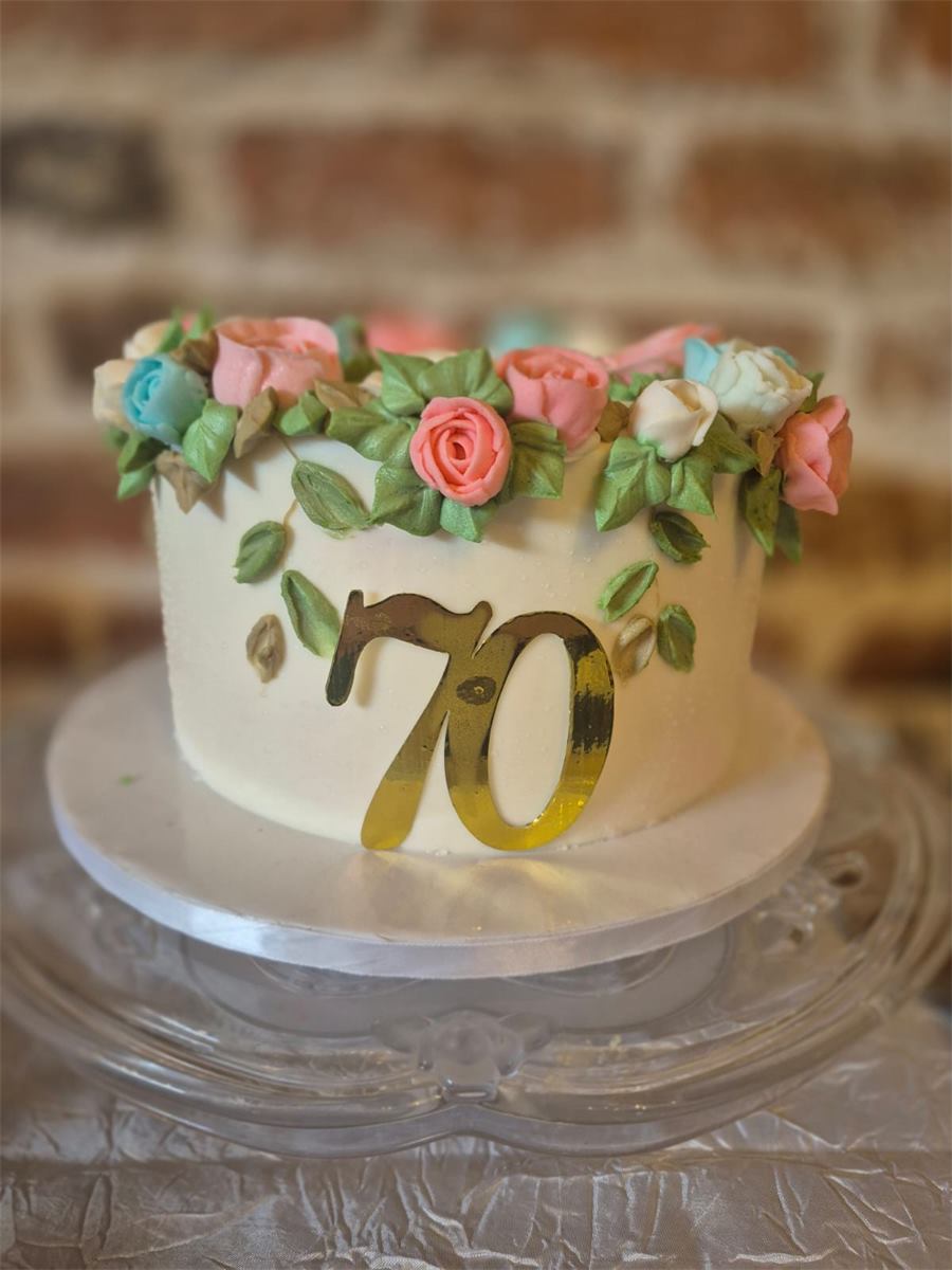 70th birthday cake decorated with flowers