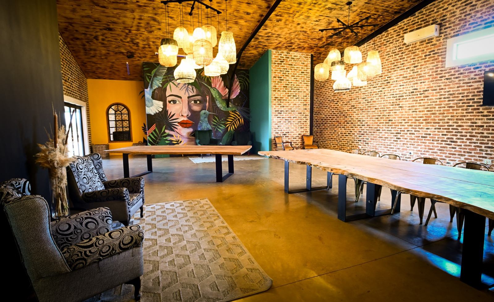Conference venue near Louis Trichardt with a long boardroom table and a painted mural